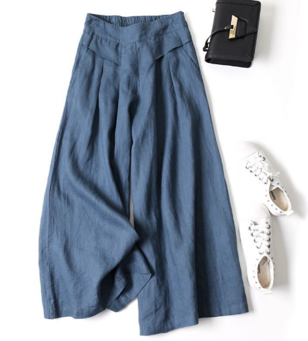 "Løse fritidsbukser til kvinder i premium syntetisk tekstil, åndbar med justerbar talje, afslappet pasform og ensfarvet desig