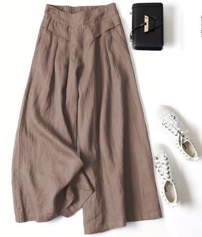 "Løse fritidsbukser til kvinder i premium syntetisk tekstil, åndbar med justerbar talje, afslappet pasform og ensfarvet desig