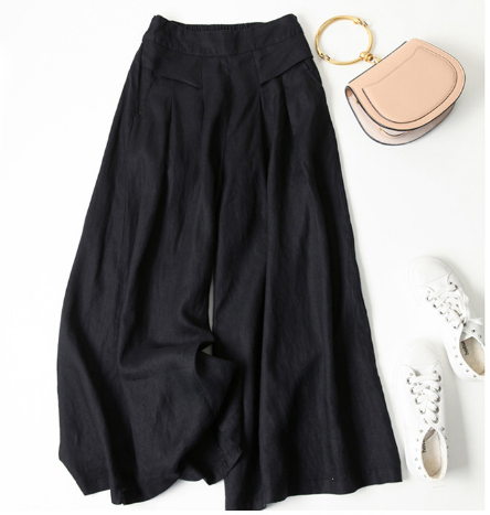 "Løse fritidsbukser til kvinder i premium syntetisk tekstil, åndbar med justerbar talje, afslappet pasform og ensfarvet desig