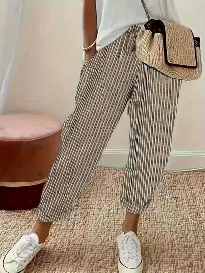 "Løse Gitte™ bukser til kvinder, elastisk talje, stilfulde sidelinjer, afslappet pasform for daglig komfort og elegance."