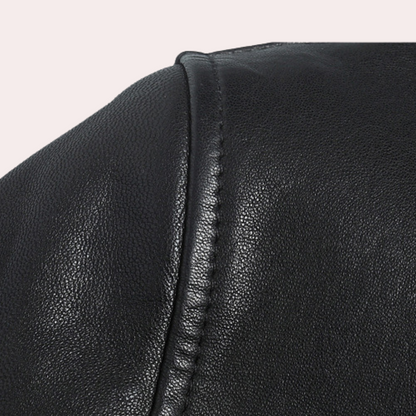 "Moderne herrelæderjakke i sort med elegant vindtæt design, ideel til hverdag og fest, fremstillet i PU-læder."