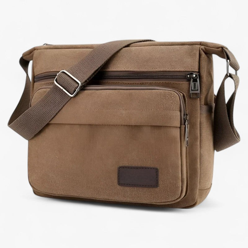 "Multifunktionel canvas skuldertaske til mænd med justerbar rem og rummelige lommer til daglig brug."