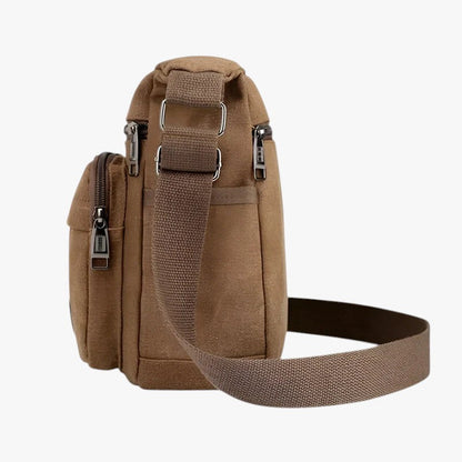 "Multifunktionel canvas skuldertaske til mænd med justerbar rem og rummelige lommer til daglig brug."