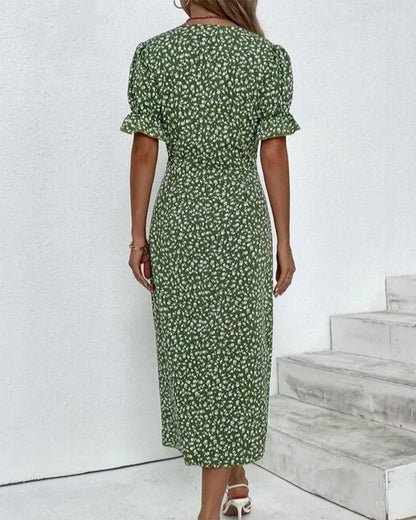 "Rosa kjole med blomsterprint og V-hals, elegant look til kvinder, flatterende pasform til både hverdag og fest."