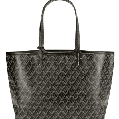 "Rummelig Ainara håndtaske med forstærkede håndtag, elegant brun farve og sofistikeret design, perfekt til hverdagsbrug."