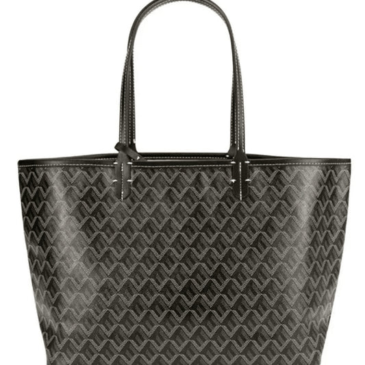 "Rummelig Ainara håndtaske med forstærkede håndtag, elegant brun farve og sofistikeret design, perfekt til hverdagsbrug."