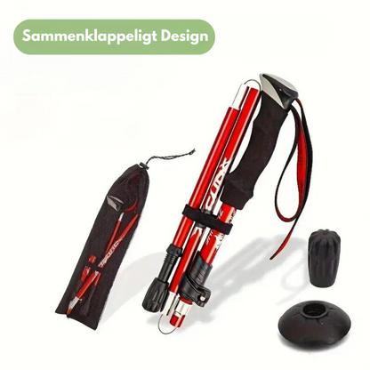 "Sammenklappelig let vandrestok i aluminium, justerbar længde, ideel til alle terræner med praktisk håndledsrem."