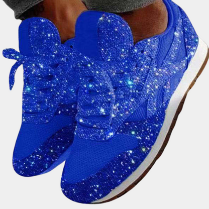 Sort glitrende sportssko til kvinder med pailletter og polstrede såler. Ideelle til træning og sociale begivenheder.