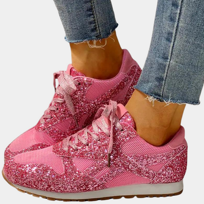 Sort glitrende sportssko til kvinder med pailletter og polstrede såler. Ideelle til træning og sociale begivenheder.