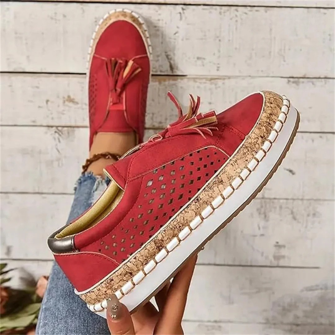 "Sort læder dame sneakers med komfortabel gummisål og åndbar foring, perfekt til stilfuld hverdagsbrug."