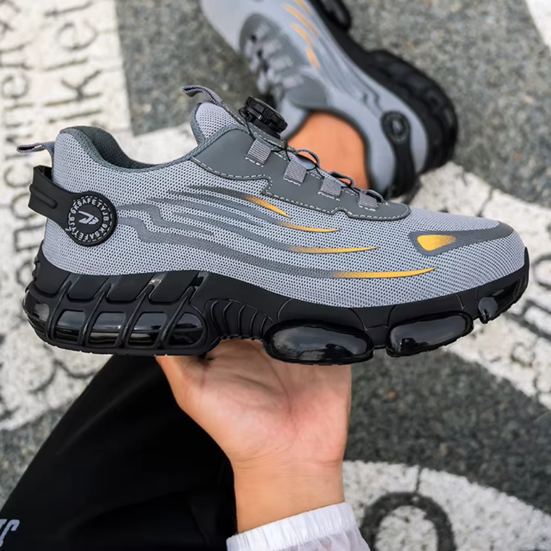 "Sort sikkerhedssko til mænd, robust og komfortabel med ståltåkappe og skridsikker sål, ideel til arbejdsmiljøer."