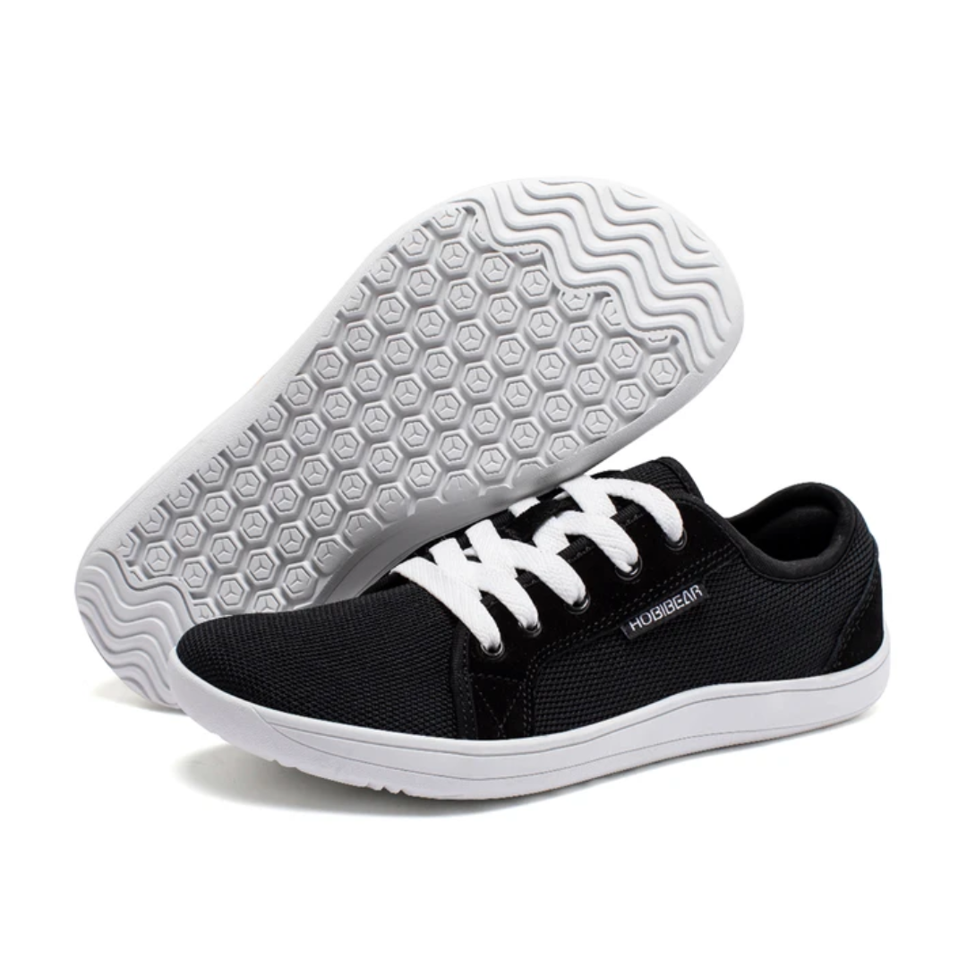 Sorte barfods sneakers til mænd med strikket overdel, bred tåboks og gummisål, perfekt til udendørs brug og daglig komfort.