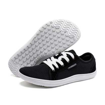 Sorte barfods sneakers til mænd med strikket overdel, bred tåboks og gummisål, perfekt til udendørs brug og daglig komfort.