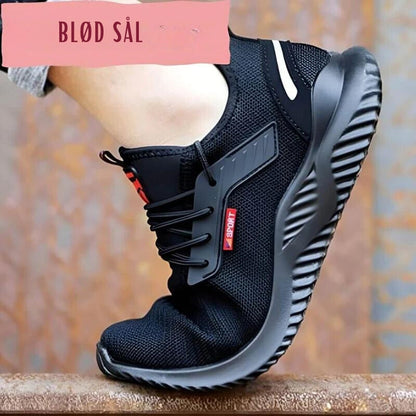 "Sorte, skridsikre sikkerhedssko med åndbart design og hård tåbeskyttelse for komfort og sikkerhed"