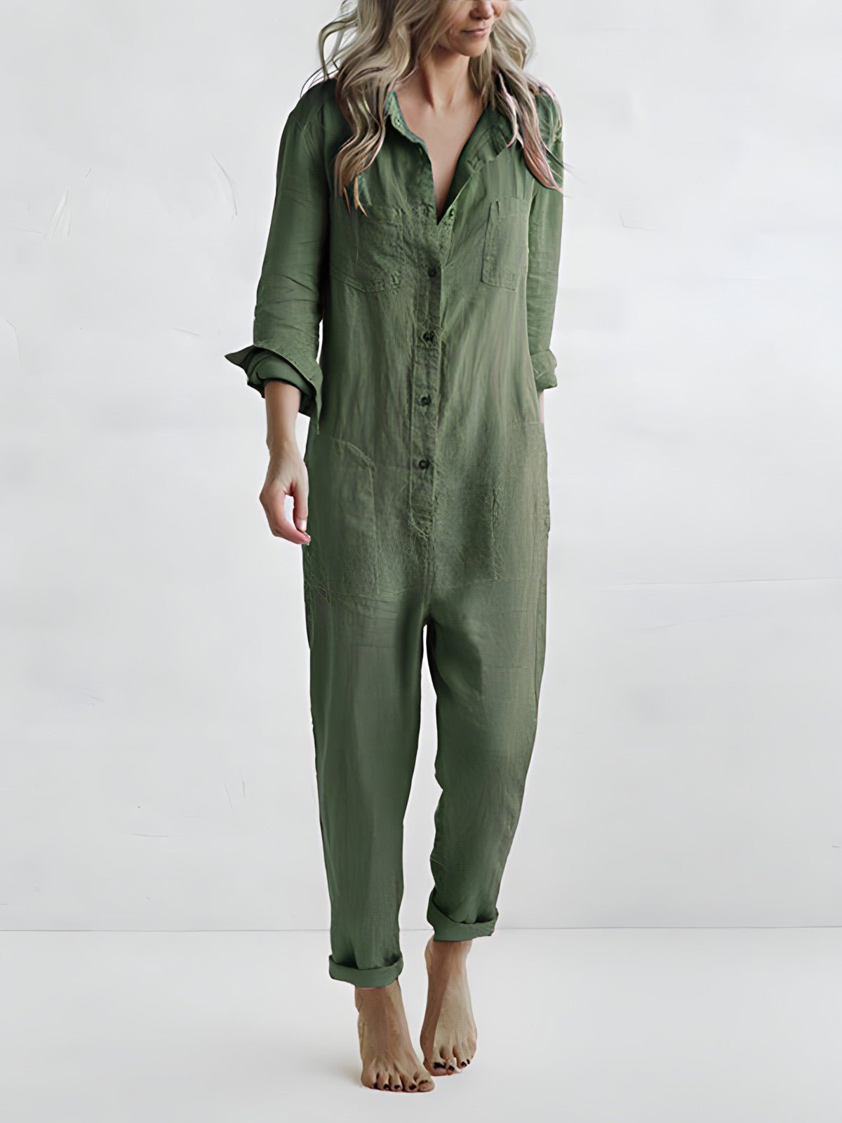 Stilfuld blå og grøn Kaya jumpsuit til kvinder, elegant design med lange ærmer og komfortabel pasform til enhver lejlighed.