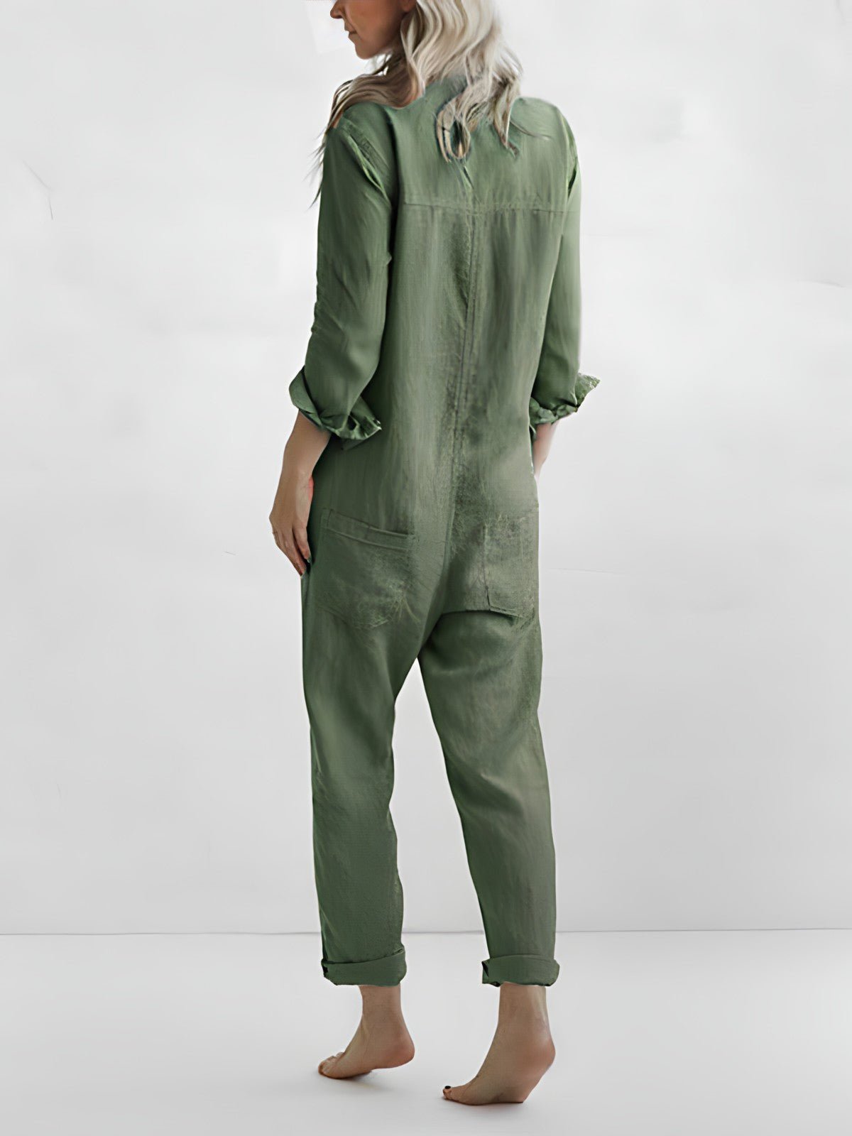 Stilfuld blå og grøn Kaya jumpsuit til kvinder, elegant design med lange ærmer og komfortabel pasform til enhver lejlighed.