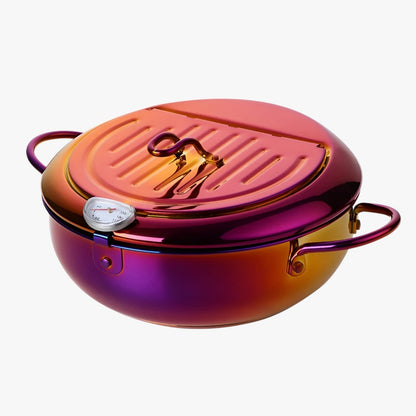 "Stilfuld frituregryde af rustfrit stål med indbygget termometer for præcis madlavning og nem rengøring."