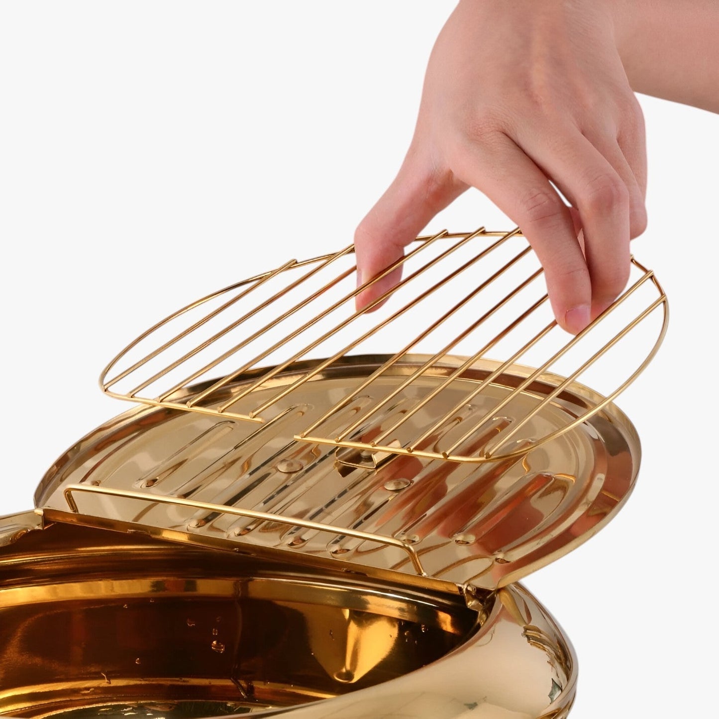 "Stilfuld frituregryde af rustfrit stål med indbygget termometer for præcis madlavning og nem rengøring."