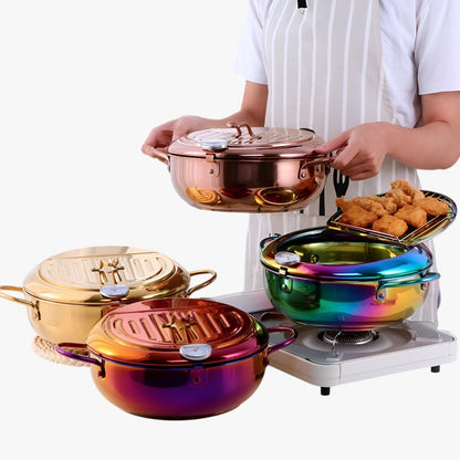 "Stilfuld frituregryde af rustfrit stål med indbygget termometer for præcis madlavning og nem rengøring."