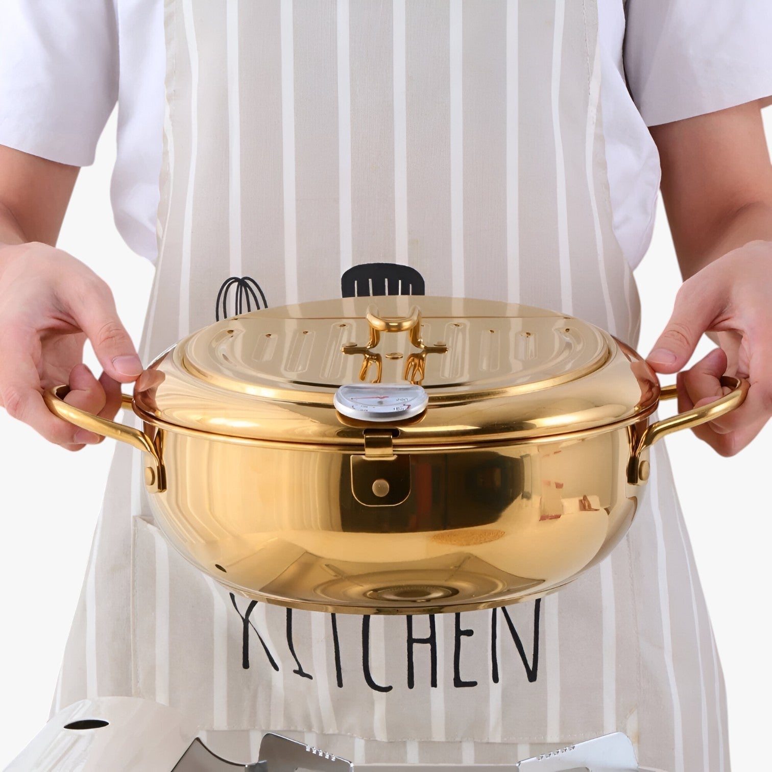 "Stilfuld frituregryde af rustfrit stål med indbygget termometer for præcis madlavning og nem rengøring."