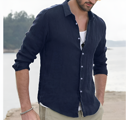 "Stilfuld herreskjorte i 100% økologisk hør, åndbar og komfortabel, tilgængelig i blå, hvid og sort."