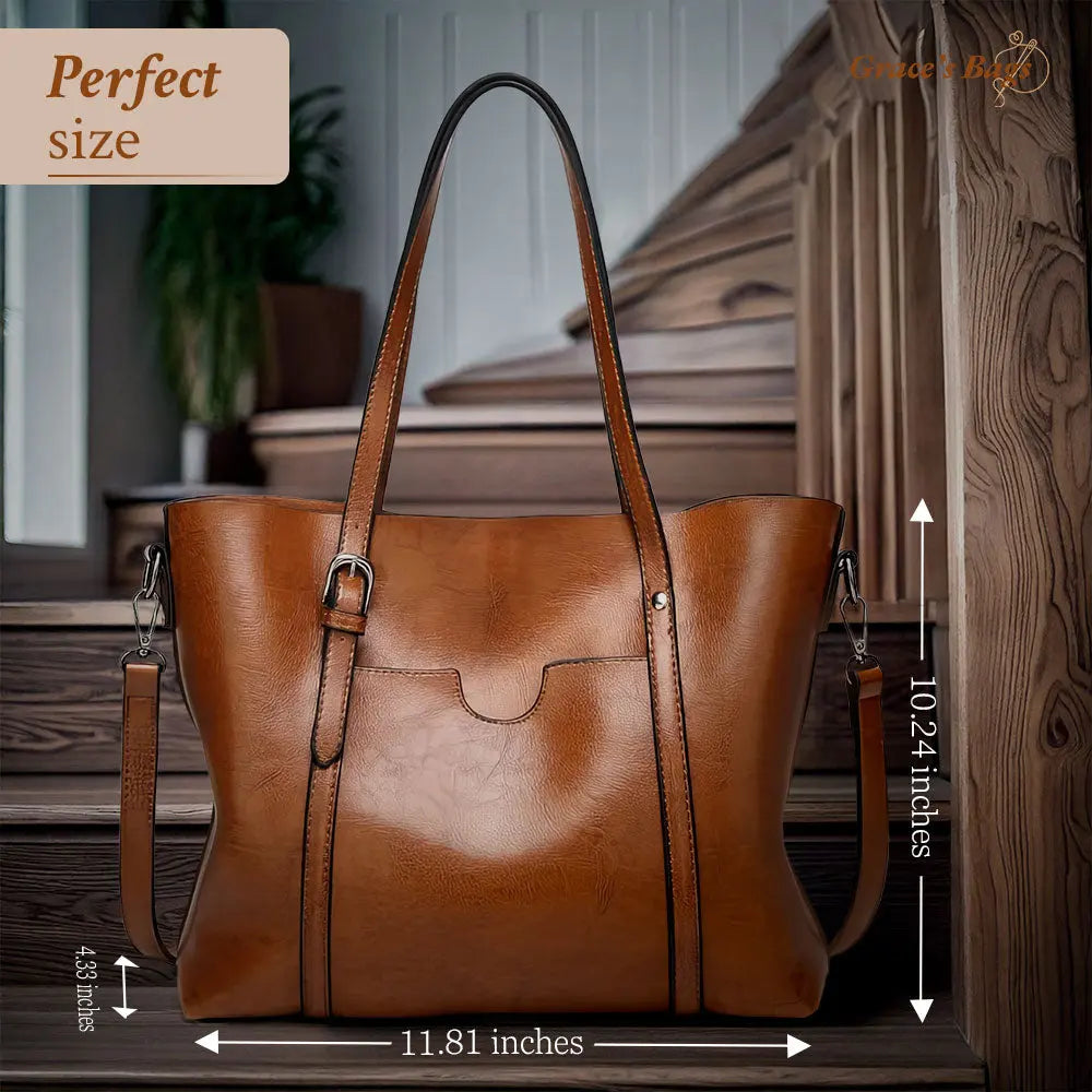 "Stilfuld skuldertaske i kunstlæder, tilgængelig i flere farver, inkl. blå og sort, klassisk og elegant design til kvinder."