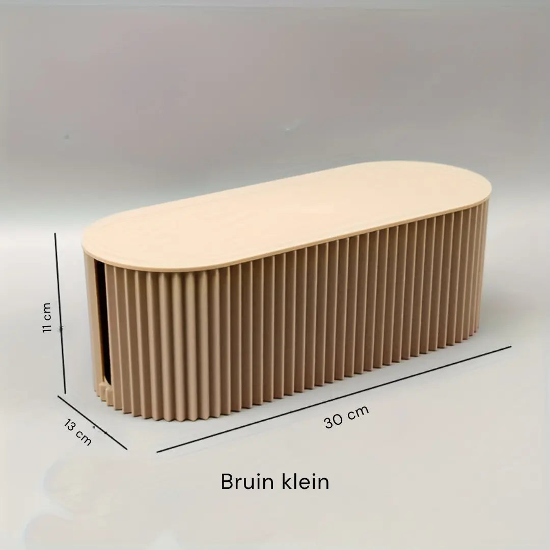 Stilren kabelorganiseringsboks i moderne design, perfekt til at holde dine kabler skjult og organiseret i hjemmet.