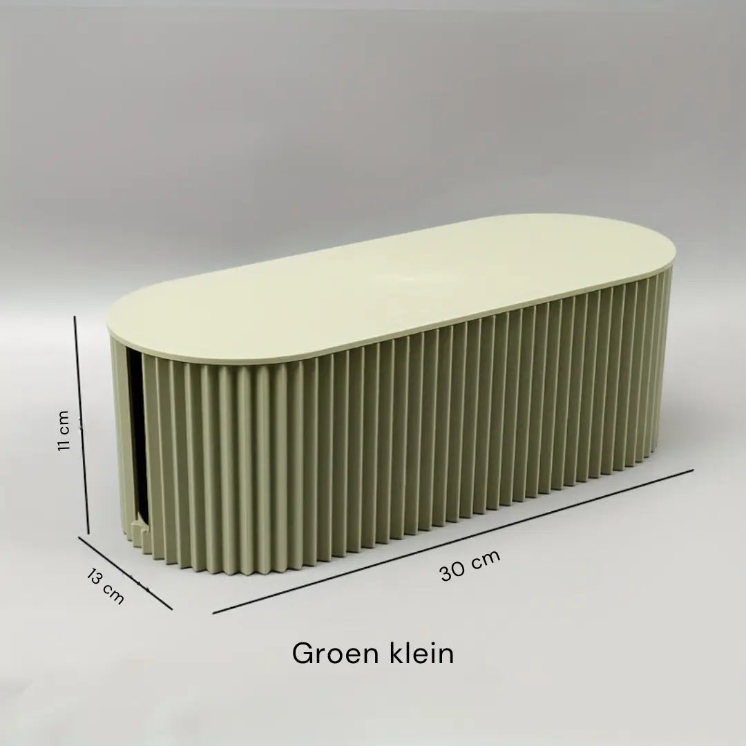 Stilren kabelorganiseringsboks i moderne design, perfekt til at holde dine kabler skjult og organiseret i hjemmet.