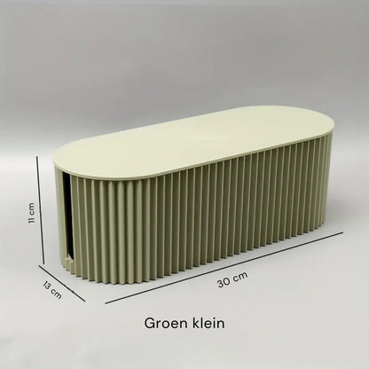 Stilren kabelorganiseringsboks i moderne design, perfekt til at holde dine kabler skjult og organiseret i hjemmet.