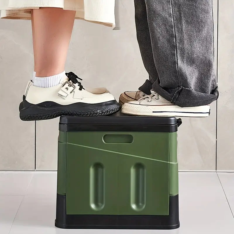 "Transportabelt foldbart campingtoilet i grå, letvægts design til camping og festivaler med kapacitet på 150 kg."