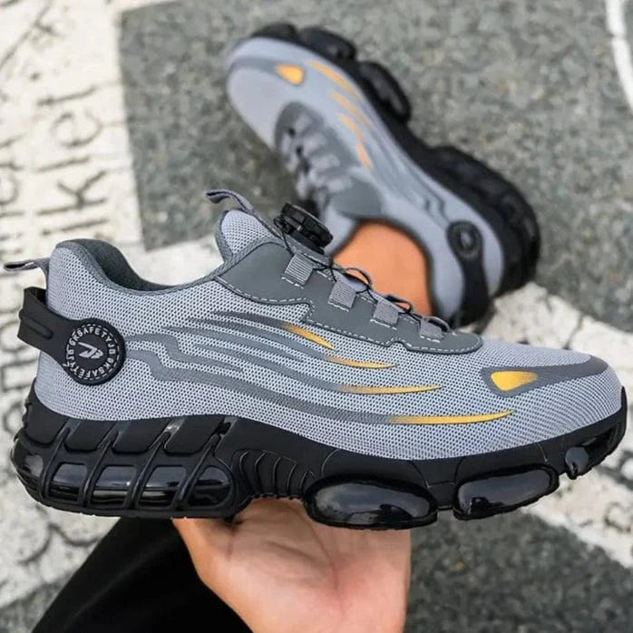 "Unisex letvægts sikkerhedssko uden snørebånd, sorte med skridsikker sål og ståltåkappe, moderne arbejdssko"