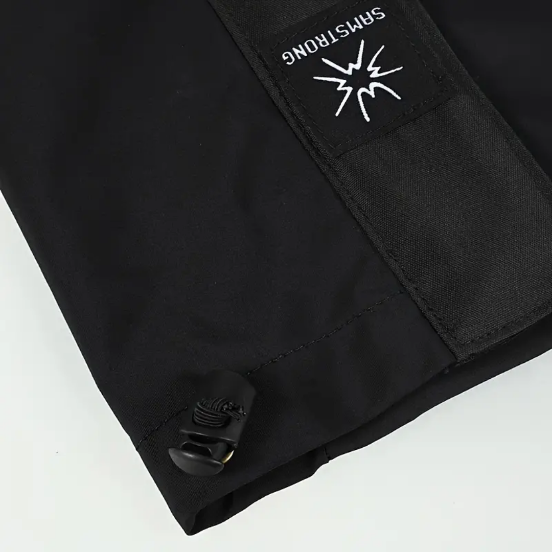 "Vandtætte, justerbare gamacher i sort polyester for optimal benbeskyttelse til udendørs eventyr i alle vejrforhold."