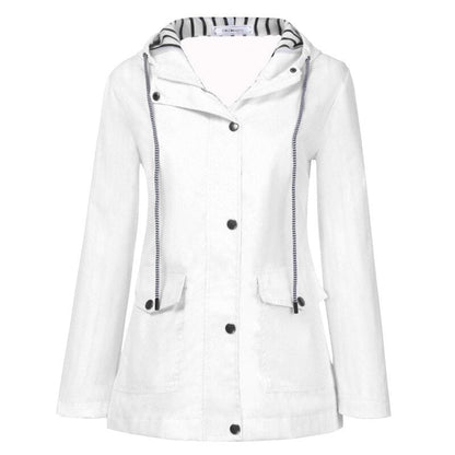 "Vera 3-i-1 vandtæt jakke med aftagelig hætte, stilfuld og alsidig, perfekt til udendørs eventyr for kvinder."