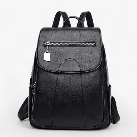 "Vintage læder rygsæk i blødt brun læder med polstrede stropper og rummelig indretning, perfekt til stilfulde rejser."