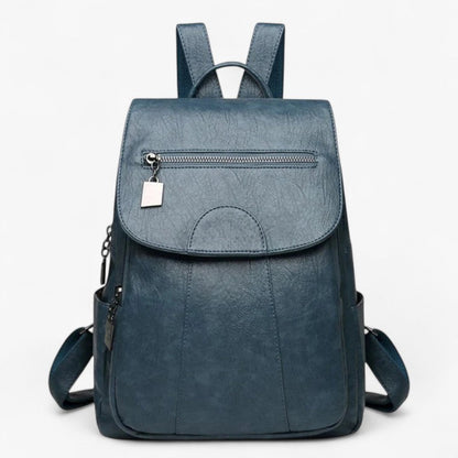 "Vintage læder rygsæk i blødt brun læder med polstrede stropper og rummelig indretning, perfekt til stilfulde rejser."