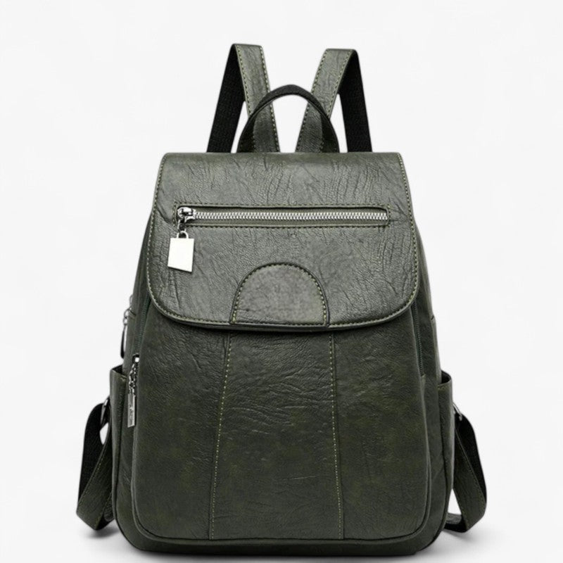 "Vintage læder rygsæk i blødt brun læder med polstrede stropper og rummelig indretning, perfekt til stilfulde rejser."