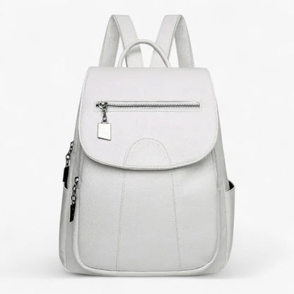 "Vintage læder rygsæk i blødt brun læder med polstrede stropper og rummelig indretning, perfekt til stilfulde rejser."