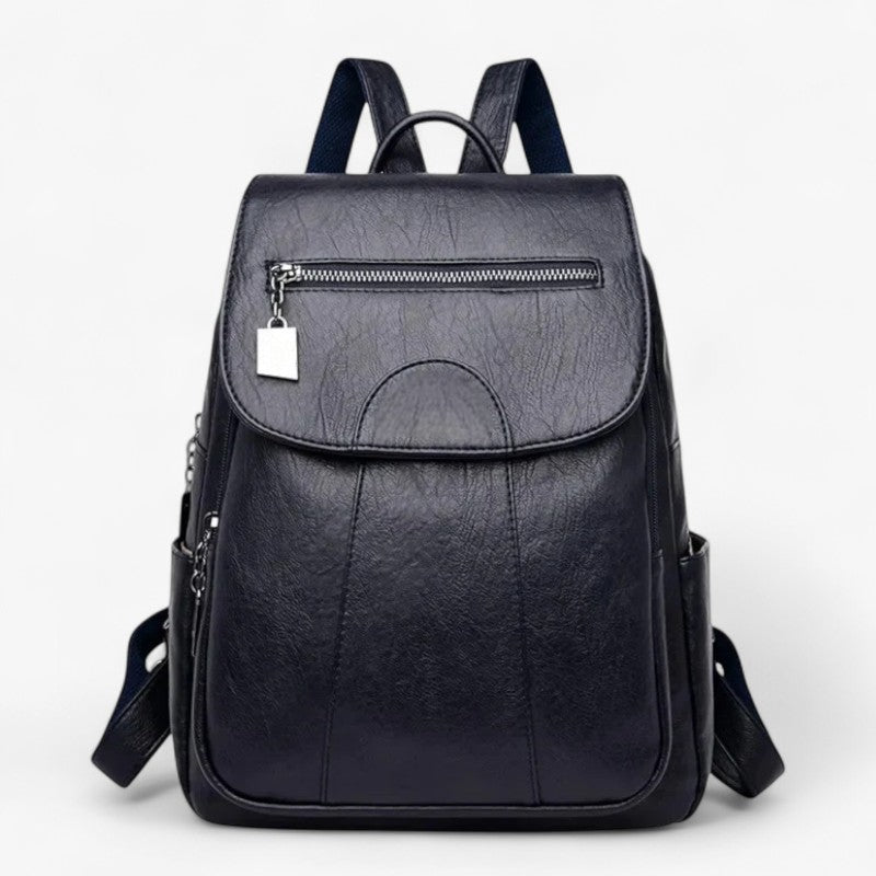 "Vintage læder rygsæk i blødt brun læder med polstrede stropper og rummelig indretning, perfekt til stilfulde rejser."