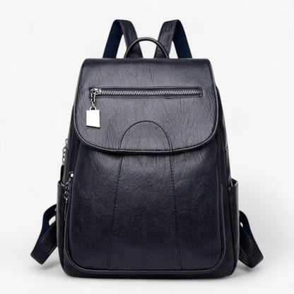 "Vintage læder rygsæk i blødt brun læder med polstrede stropper og rummelig indretning, perfekt til stilfulde rejser."